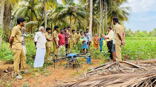 Agriculture college students and agriculture department officials explained the process of drone spraying to farmers in Nambiur forest.